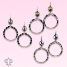 Gold Austrian crystal earrings featuring flat oval and round bead circle designs by Pink Panache Brands
