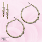 Gold cable hoop earrings with sparkling rhinestones by Pink Panache Brands, showcasing a stylish and elegant jewelry design.