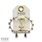 Gold rhinestone hoop and drop earrings by Pink Panache Brands featuring sparkling stones and elegant design.