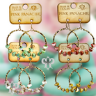 Green stone circle earrings by Pink Panache Brands, featuring a stylish and elegant design in a natural stone hoop style.