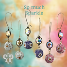 Pink Panache Brands floral pattern dangle earrings with purple Austrian crystals and crystal mesh design.