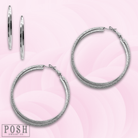 Silver double crossover hoop earrings by Pink Panache Brands, featuring a stylish intertwined design.