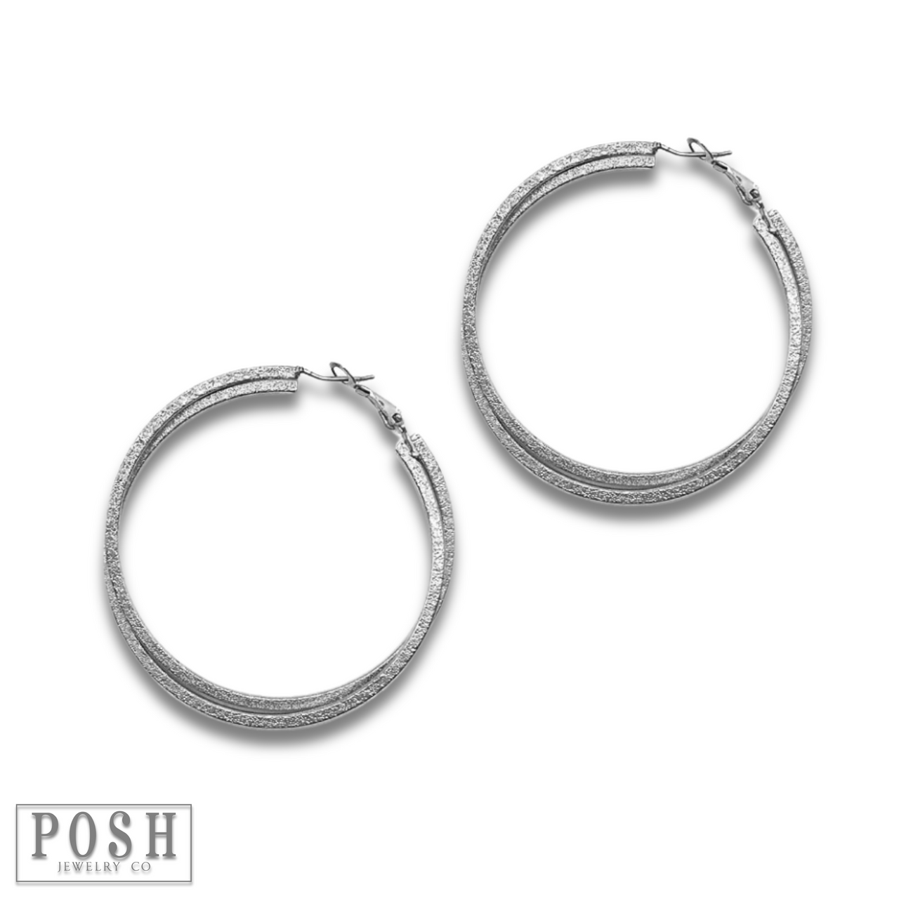 Silver double crossover hoop earrings by Pink Panache Brands, showcasing sleek, intertwined hoop design.