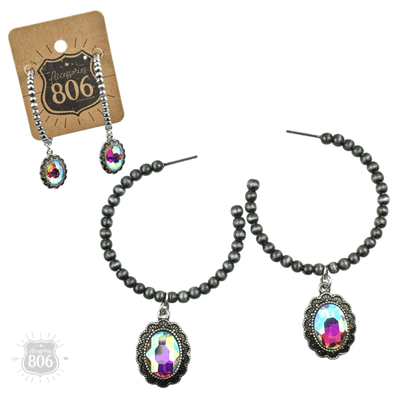 Silver Navajo style bead hoop earring with oval rhinestone charm by Pink Panache Brands, showcasing intricate beadwork and sparkling accents.