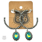 Silver Navajo style bead hoop earring with oval rhinestone charm from Pink Panache Brands, featuring intricate bead details and sparkling accents.