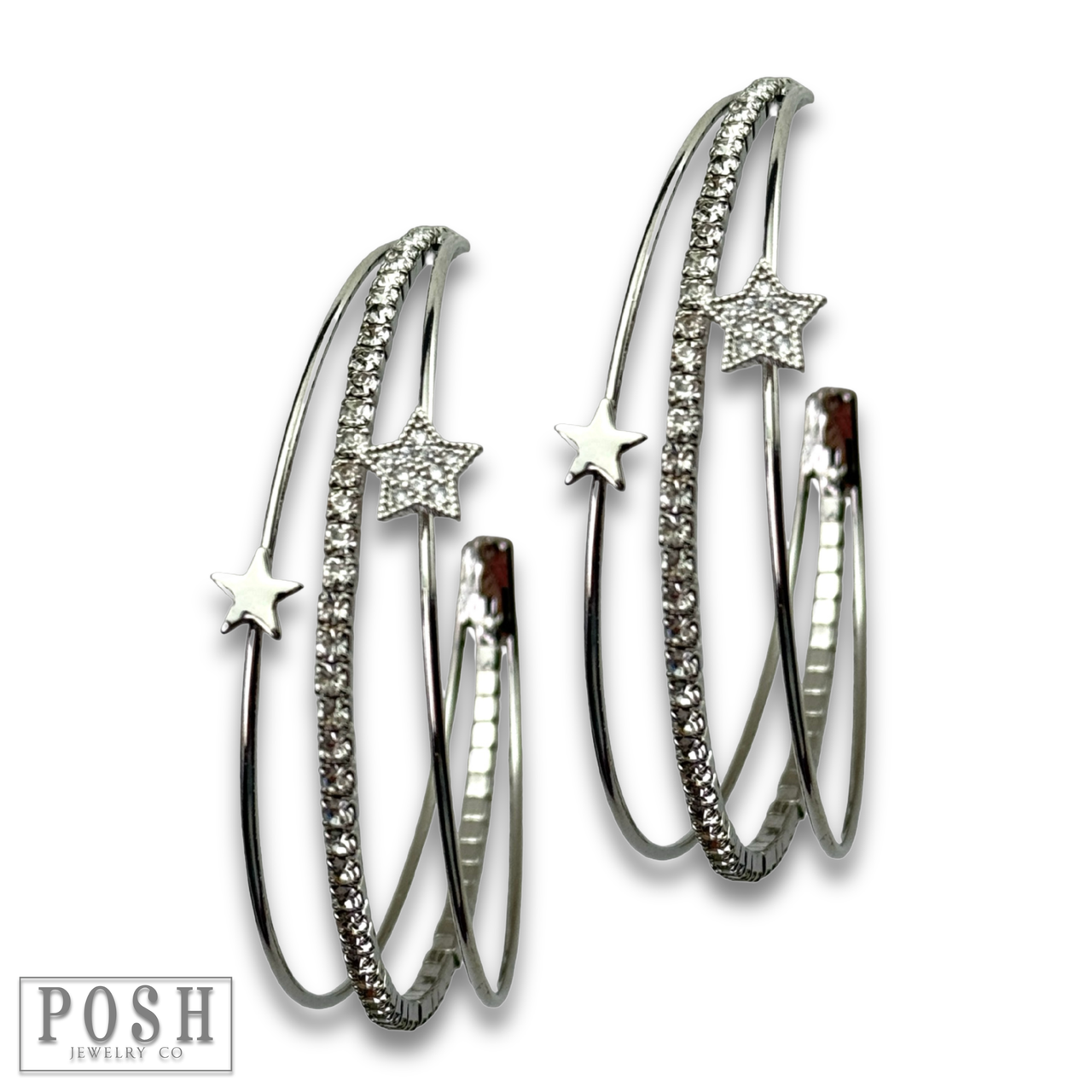 Silver triple hoop earrings by Pink Panache Brands featuring rhinestones and star charms for a stylish look.