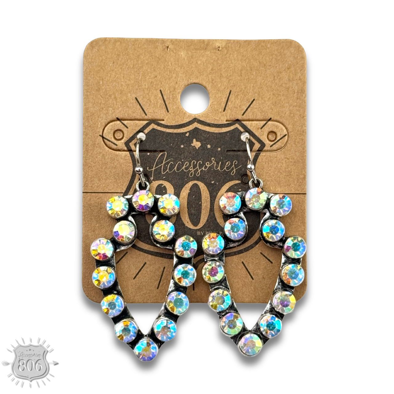 Turquoise rhinestone arrowhead earring from Pink Panache Brands, featuring sparkling embellishments and a bold arrowhead design.