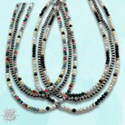 Multi-color and silver beaded necklace from Pink Panache Brands, featuring vibrant beads and a stylish design.