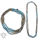 Turquoise blue bead necklace from Pink Panache Brands featuring round beads on a delicate string.