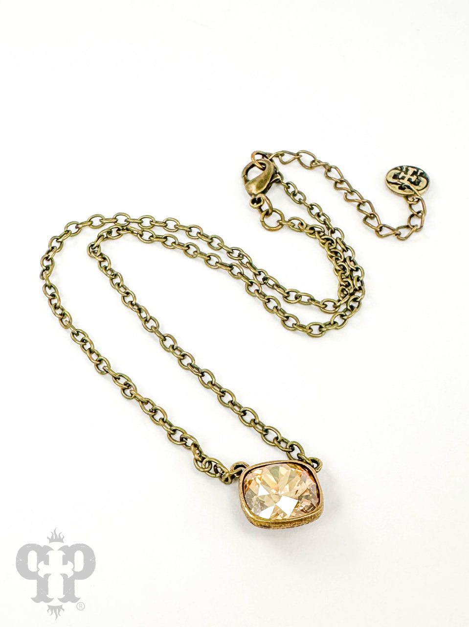 Austrian square crystal chain necklace by Pink Panache Brands with iridescent bronze 12mm crystals, close-up of the elegant jewelry.
