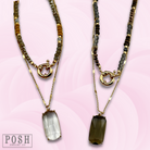 Brown necklace with large glass pendant from Pink Panache Brands, featuring a stylish and eye-catching jewelry design.