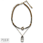 Brown necklace with large glass pendant from Pink Panache Brands, showcasing a stylish and eye-catching jewelry piece.