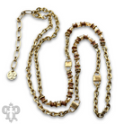 Gold chain and champagne bead necklace from Pink Panache Brands featuring a delicate gold chain with elegant champagne-colored beads.