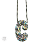 Silver necklace with a sparkling rhinestone letter pendant, stylish jewelry piece from Pink Panache Brands.