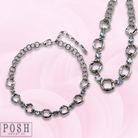 Silver chain necklace with square rhinestone accents from Pink Panache Brands, showcasing a stylish and sparkling jewelry piece.