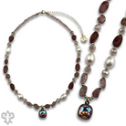 Pink Panache Brands quartz and freshwater pearl necklace with Austrian crystal, elegant jewelry featuring white quartz and shimmering crystals.