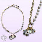 White jasper bead necklace with Austrian crystal accents from Pink Panache Brands, featuring elegant round beads and sparkling crystals.
