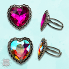 Pink Panache Brands rhinestone heart ring featuring a vibrant pink band and sparkling heart-shaped design.