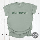 Plantrovert round pigment dyed graphic T-shirt from The Graphic Tee, casual short-sleeve tee with plant-themed design.