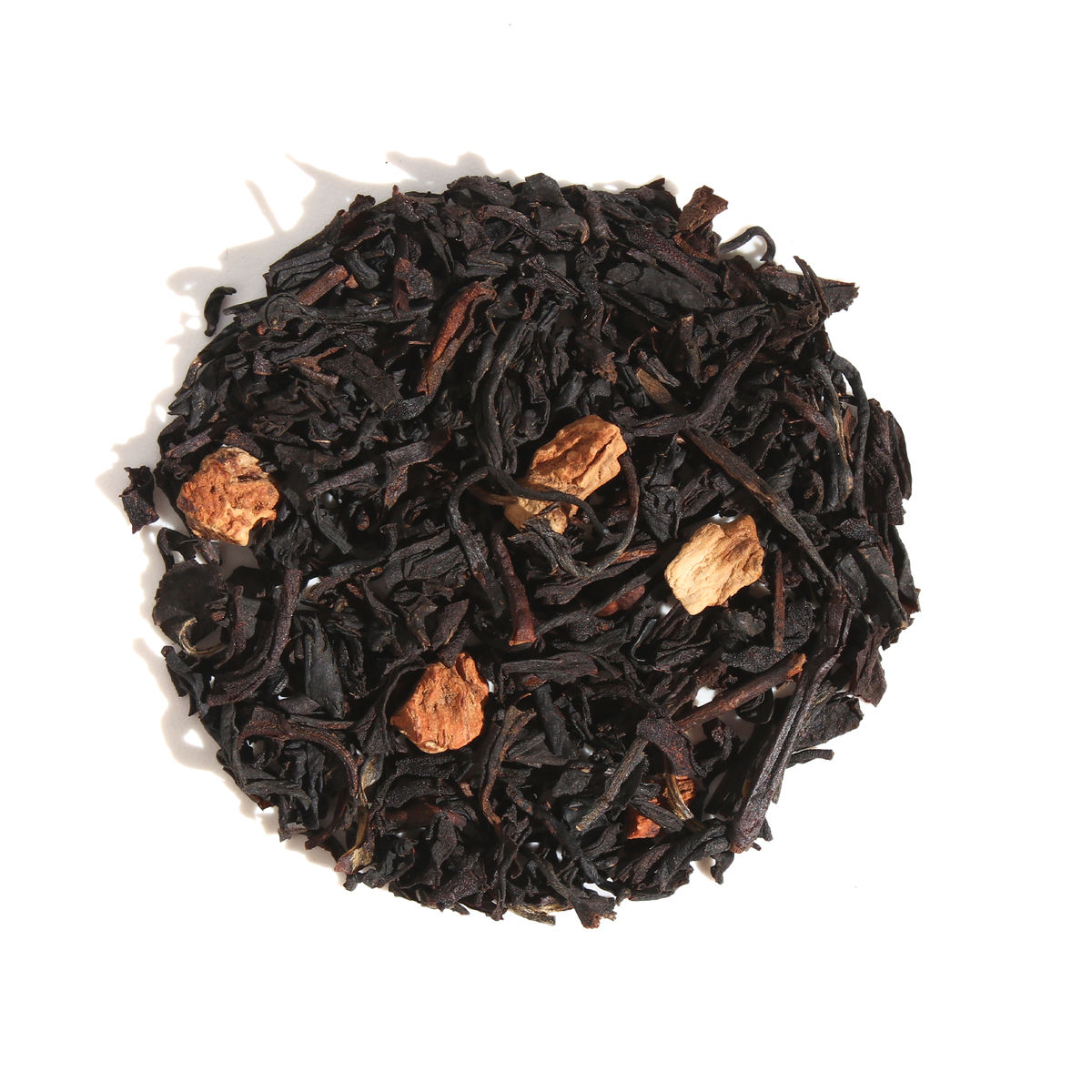 Plum Deluxe Tea Root Beer Black Tea in a circular package with a black and beige design featuring root beer flavor elements.