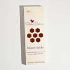 Amber Carrot Blossom Honey Sticks for Tea by Plum Deluxe Tea, natural honey sticks ideal for sweetening tea drinks.