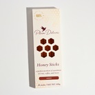 Amber Carrot Blossom Honey Sticks for Tea by Plum Deluxe Tea, natural honey sticks in clear packaging, ideal for sweetening tea.