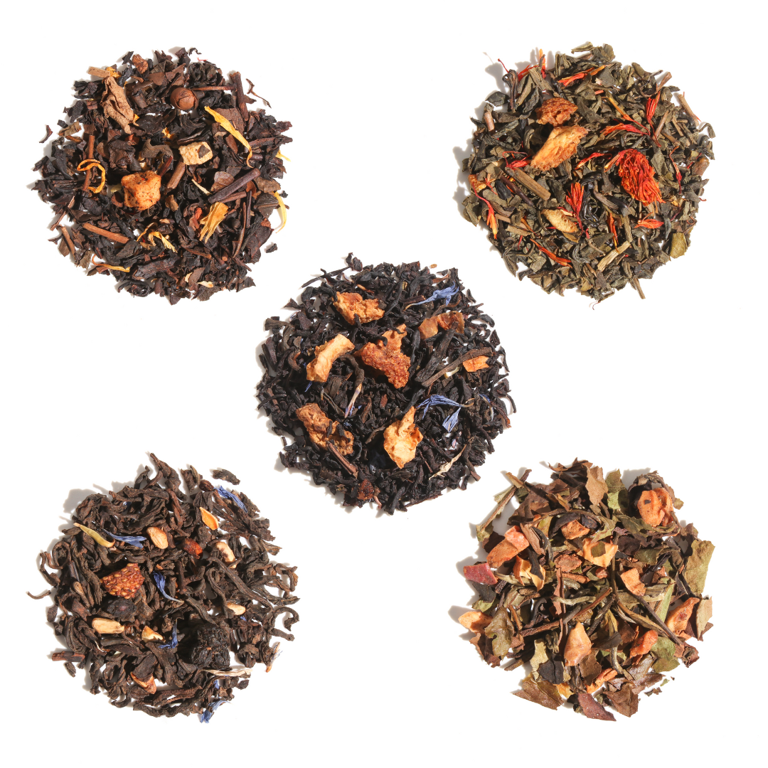 Assorted tea sampler kit from Plum Deluxe Tea featuring a variety of flavorful tea blends for refreshing tasting experiences.