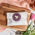 Big Flavor Refresh Sampler Kit from Plum Deluxe Tea featuring a variety of colorful tea samples in a gift box.