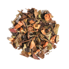 A tin of Plum Deluxe Bookshop Blend White Tea with cinnamon and black currant flavor, displayed with a tea cup and tea leaves.