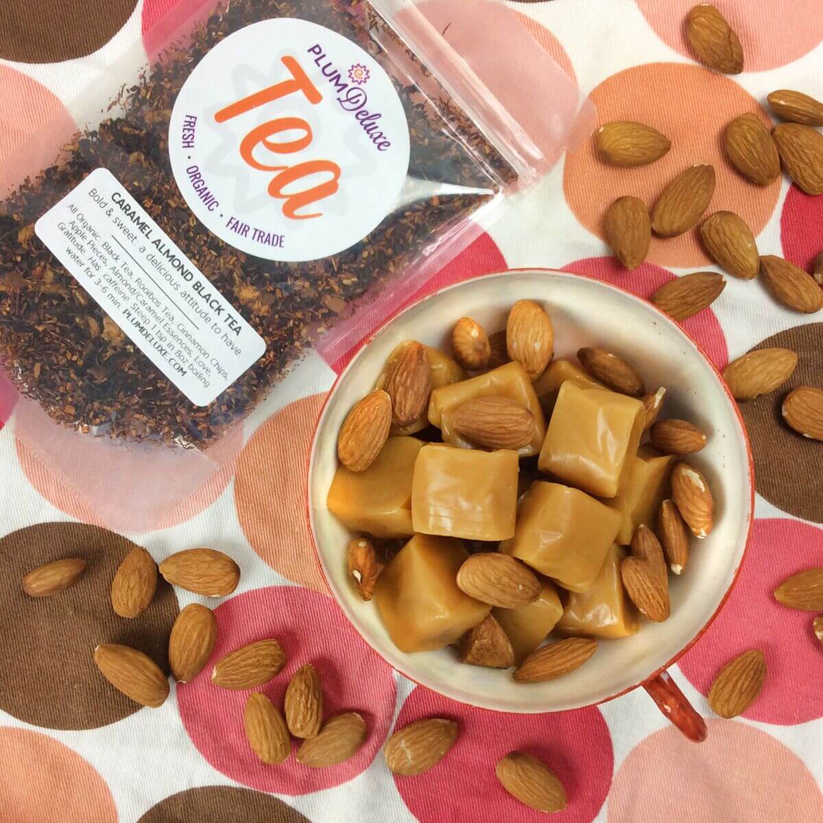Cup of Caramel Almond Black Tea by Plum Deluxe Tea, showcasing the brewed tea in a clear glass cup with a caramel almond flavor.