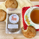 Herbal dessert tea by Plum Deluxe featuring caramel and snickerdoodle flavors in a warm, inviting cup.