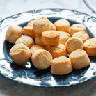 Delicious classic shortbread bites by Plum Deluxe Tea, buttery and crumbly treats perfect for snacking or tea time.