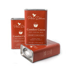 Dairy-free Comfort Cocoa Hot Cocoa Mix by Plum Deluxe Tea in a colorful package with steaming mug of hot cocoa