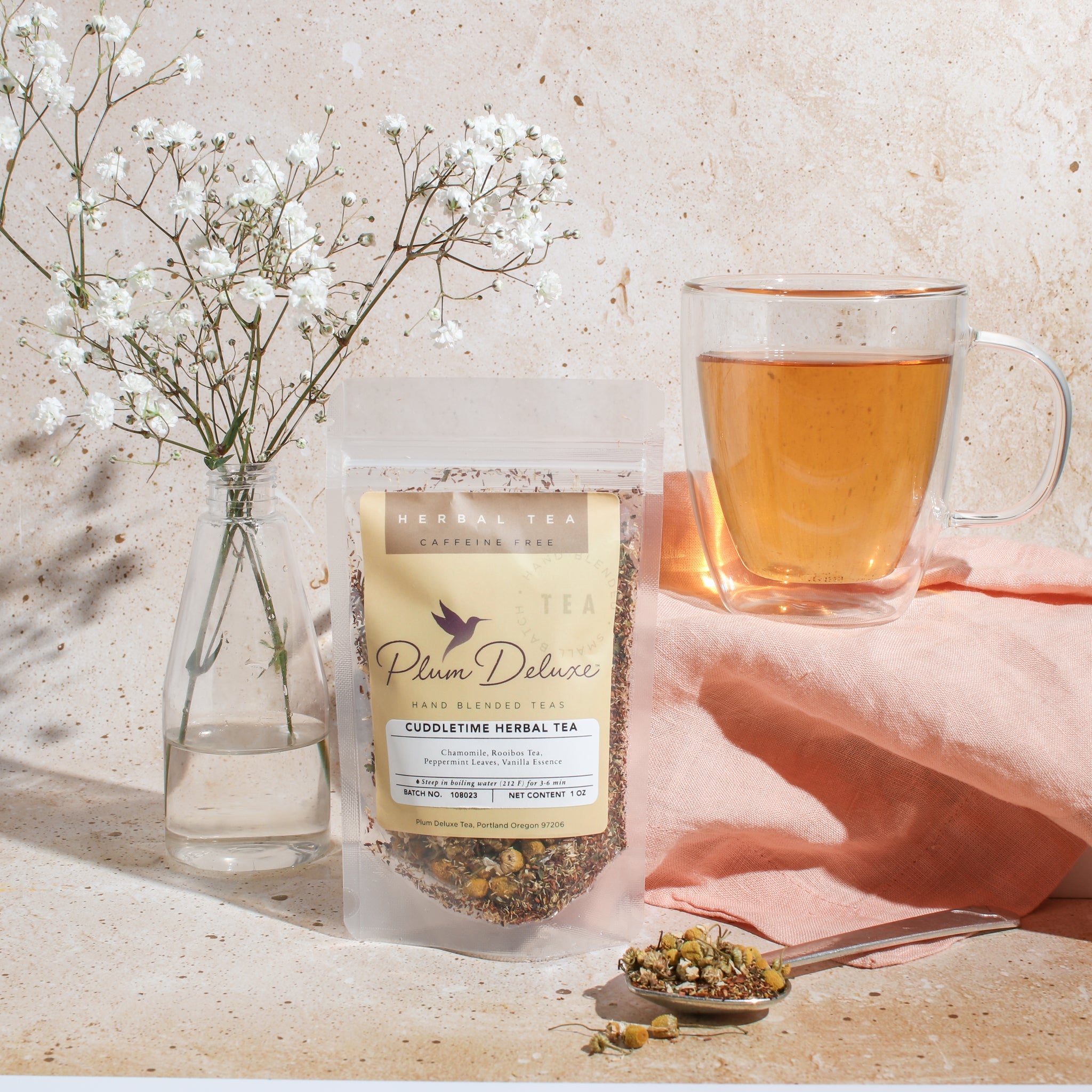 Cuddletime Herbal Tea by Plum Deluxe, chamomile and mint blend in a tea bag, ideal for calming and relaxing.