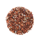 Herbal tea blend by Plum Deluxe Tea featuring chocolate and lavender flavors in a cozy tea cup.