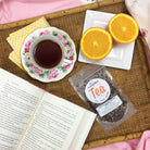 Herbal tea box for Easy Like Sunday Morning by Plum Deluxe Tea with chocolate and lavender flavor.