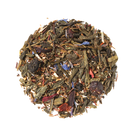 Plum Deluxe Easy to Be Green Tea with Blueberry and Hibiscus in a tea bag on a white background