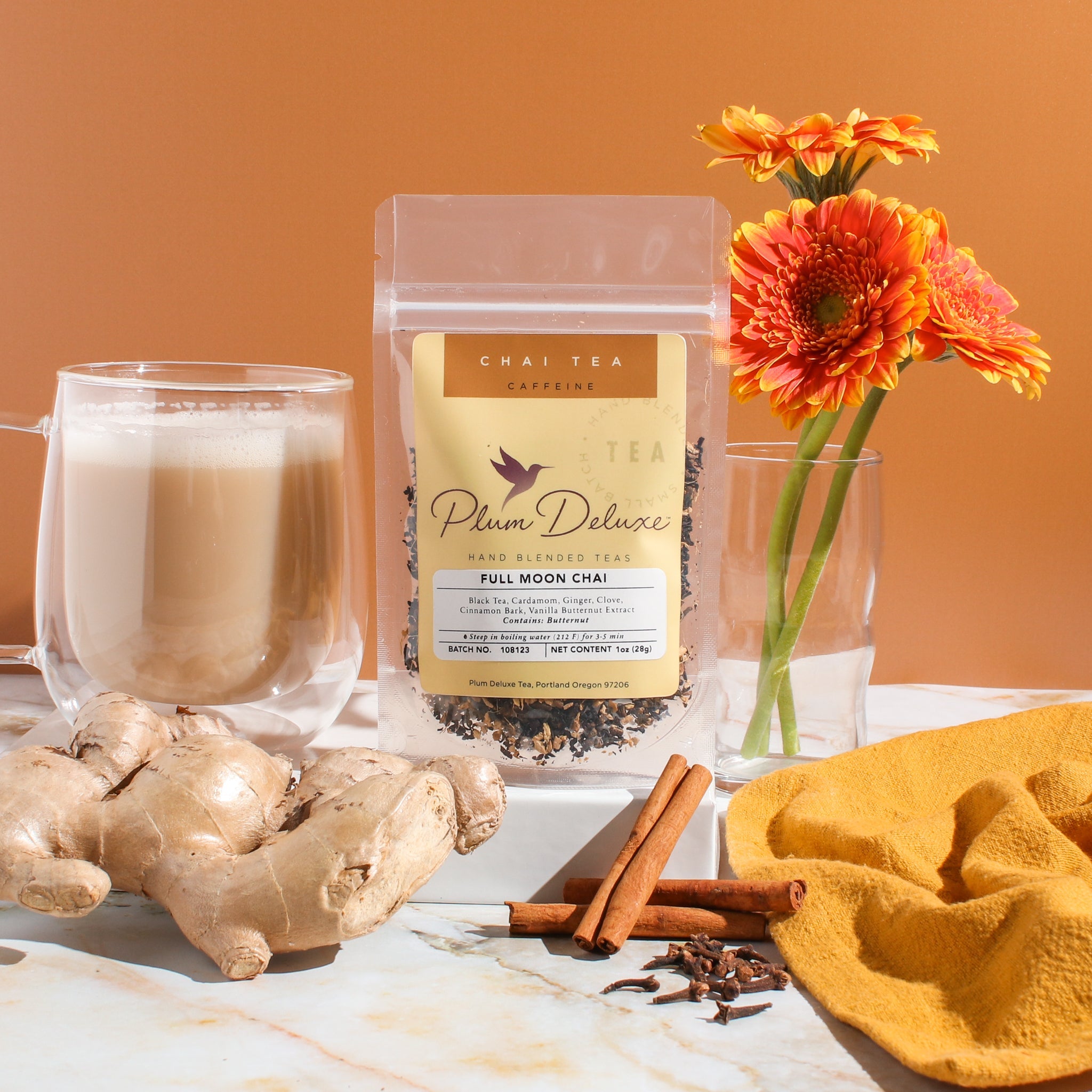 Full Moon Chai by Plum Deluxe Tea featuring vanilla, butternut, and masala spices in a steaming cup of chai tea.