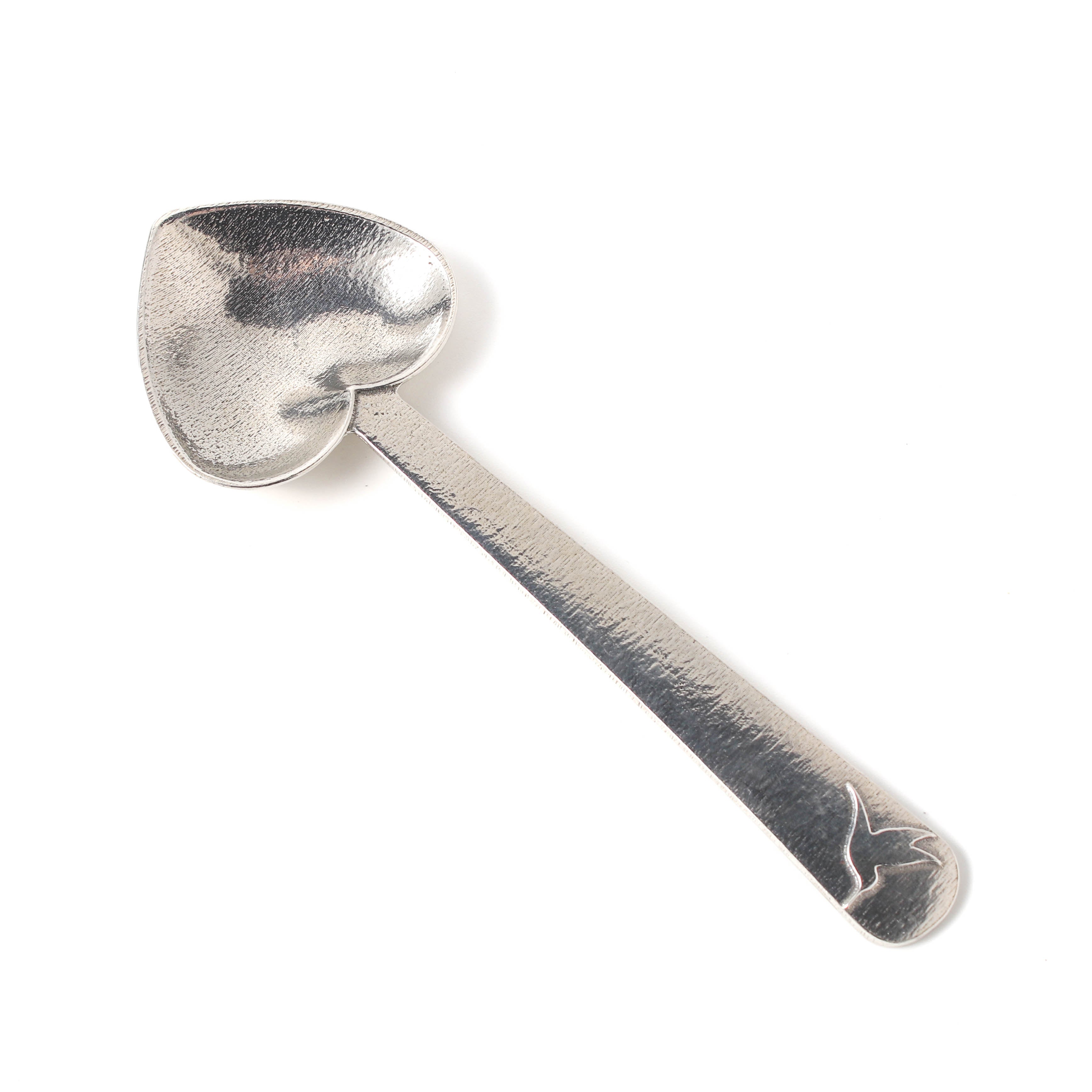 Heirloom Heart Pewter Tea Scoop by Plum Deluxe Tea, featuring a detailed heart-shaped design and polished pewter finish.
