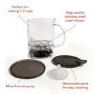 Plum Deluxe Tea Perfect Tea Maker with glass brewing vessel, stainless steel infuser, and elegant handle for fresh tea brewing.