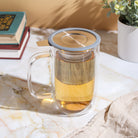 Plum Deluxe Perfect Tea Mug with infuser and lid, ceramic tea mug for steeping loose tea leaves.