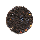 Plum Deluxe Tea Picard Black Tea Blend with Pecan and Earl Grey flavor, featuring a dark tea leaves mixture in a clear bowl