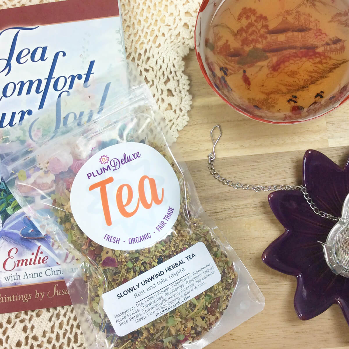 Slowly Unwind Herbal Linden Tea by Plum Deluxe, featuring linden flower, elderflower, and berry in a calming tea blend.