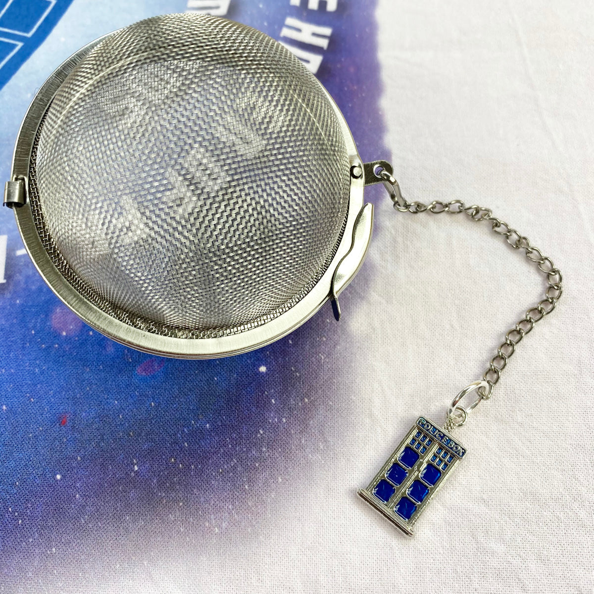 Plum Deluxe Tardis Tea Infuser Ball, stainless steel tea infuser with Tardis design for brewing loose leaf tea.