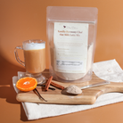 Vanilla Harmony Chai oat milk latte mix by Plum Deluxe Tea in a 10 oz package, featuring a creamy chai flavor with vanilla notes.