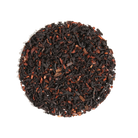 Cup of Vanilla Latte Tea with cardamom and vanilla creme from Plum Deluxe Tea, featuring a steaming, aromatic tea blend.