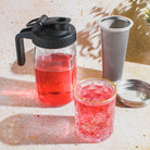 Maison Brew Cold Brew Iced Tea Mason Jar by Plum Deluxe Tea, clear glass jar with metal lid for brewing and serving iced tea.