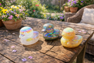 Angel Aura Duckie crystal cutie for spring, featuring rose quartz and iridescent angel aura finish, from Practical Magic Store.