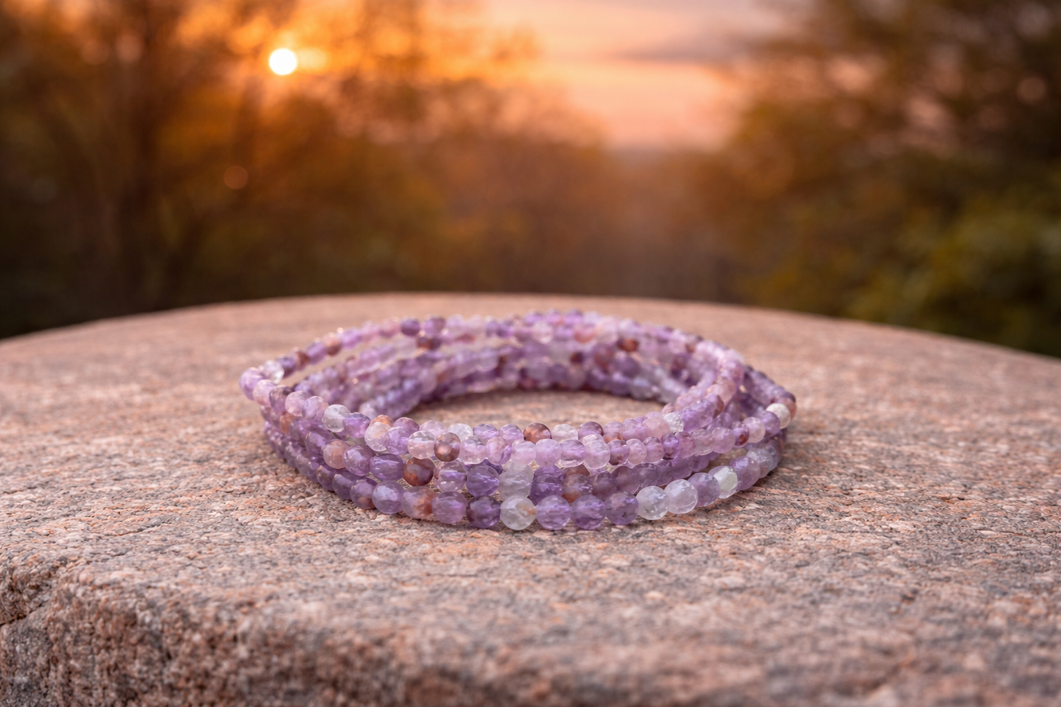4mm faceted natural amethyst and phantom quartz crystal energy bracelet with silver-tone clasp from Practical Magic Store