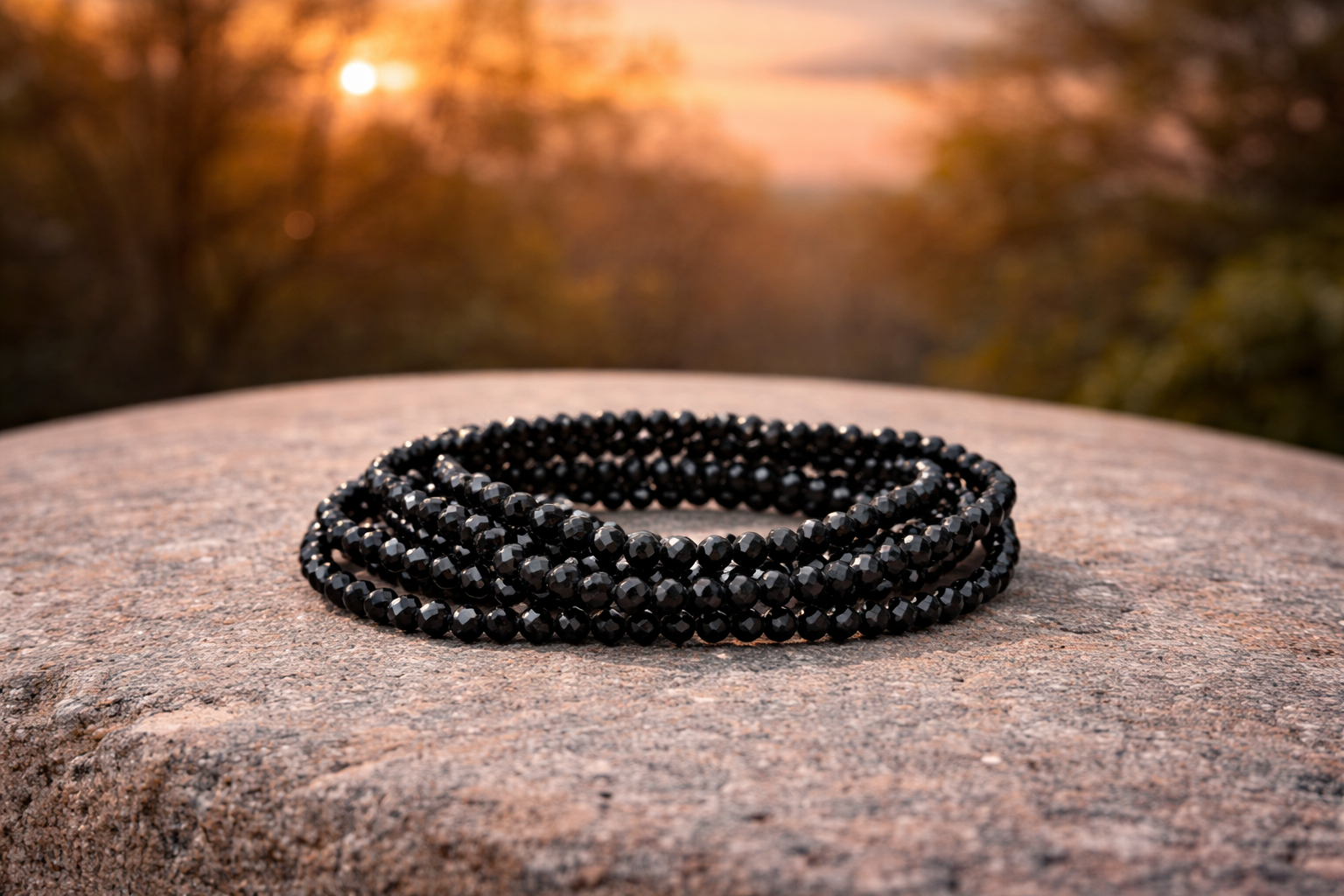 4mm faceted black tourmaline crystal energy bracelet featuring natural black tourmaline stones, designed for protection and energy balance.